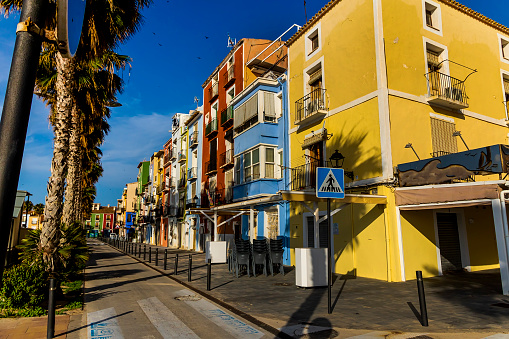 View of the colorful houses of the town of Villajoyosa , june 2021, Villajoyosa, Alicante, Spain.