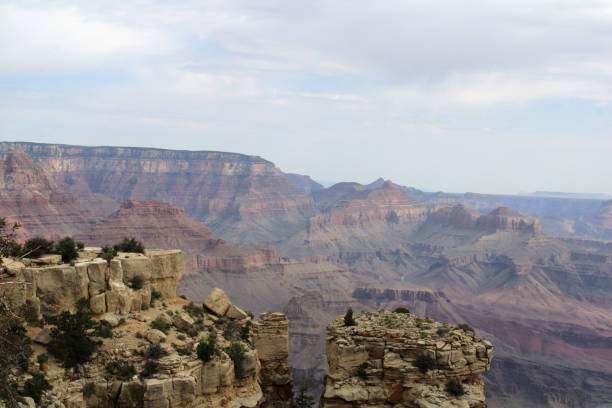 View of the Grand Canyon Looking Across Under Cloudy Sky stock photo