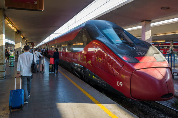View of the high-speed Italo train (this is commercial name of the Italian private company Nuovo Trasporto Viaggiatori) that arrived at the station. stock photo
