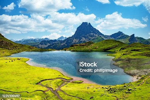 istock View of the Pic du Midi d'Ossau with lake in the French Pyrenees 1224100497