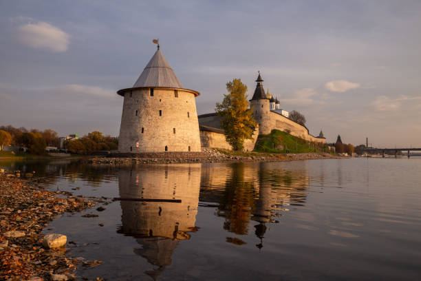 View of the Pskov Kremlin Beautiful postcard view of the Pskov Kremlin in the evening at sunset pskov russia stock pictures, royalty-free photos & images