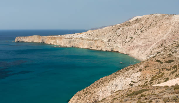 View of the remote Gerakas beach in Milos island, Cyclades, Greece. stock photo
