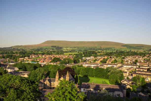 View of the ribble valley and pendle hill. Viewpoint from above Summer in the Ribble Valley. Sun shining on Pendle hill lancashire stock pictures, royalty-free photos & images