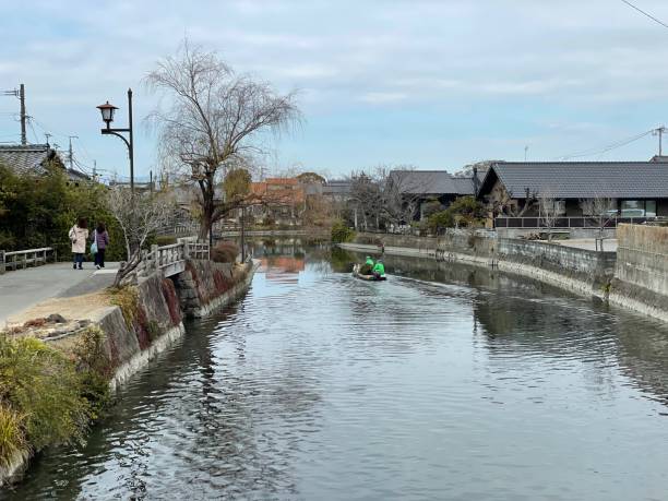 A view of the river flowing through the village of Yanagawa stock photo