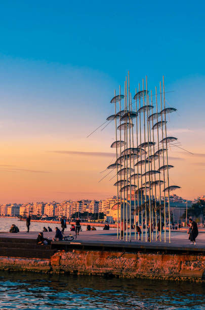 View of the Umbrellas sculpture located at the seafront of the city. stock photo