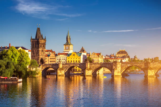 View of the Vltava River and the bridges shined with the sunset sun, Prague, the Czech Republic View of the Vltava River and the bridges shined with the sunset sun, Prague, the Czech Republic lech river stock pictures, royalty-free photos & images