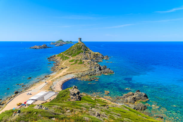 View of tower on Cape de la Parata and beautiful coast of Corsica island, France stock photo