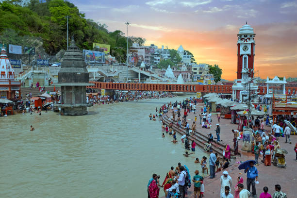 View on Haridwar at the Ganga in India on 24th of april 2017 at sunset Haridwar, India - April 24, 2017: View on Haridwar at the Ganga in India on 24th of april 2017 at sunset ghat stock pictures, royalty-free photos & images