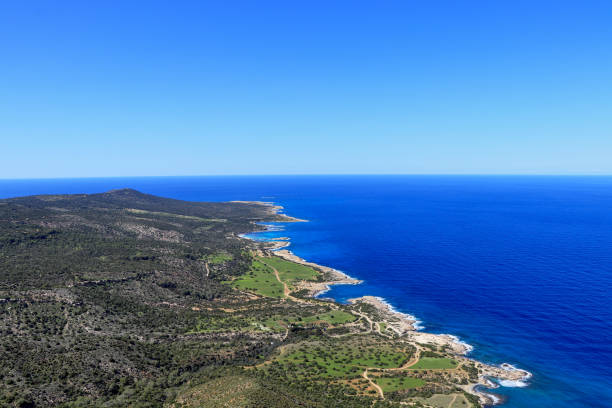View on part of Cypriot island in South europe, Specifically on Akamas peninsula national park with lagoons and beautiful clear sand beach and dark sea. Sky without clouds stock photo