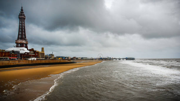 View on south from North Pier Stormy weather on Blackpool pleasure beach, September 2010 England UK, Blackpool north pier stock pictures, royalty-free photos & images