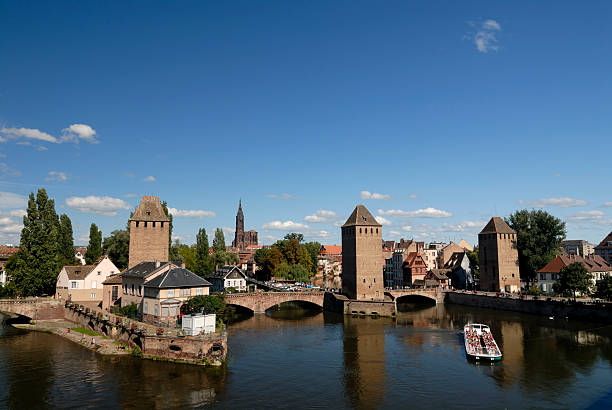 View on Strasbourg View on the city of Strassbourg in France with a blue sky and water munster france stock pictures, royalty-free photos & images