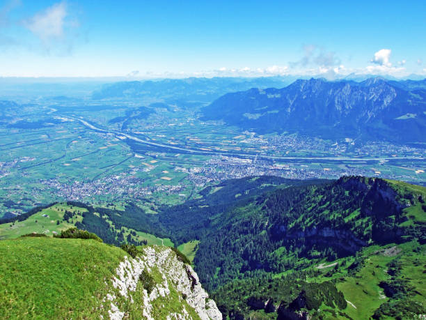View on the river Rhine valley (Rheintal) from the Alviergruppe mountain range stock photo