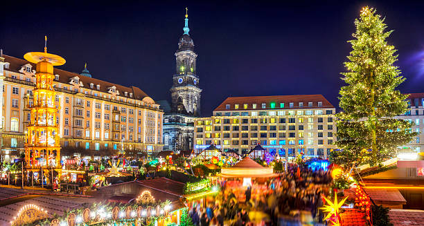 View over Dresden Christmas Market - Striezelmarkt View over Dresden´s christmas market, the Striezelmerkt on the Altmarkt with the Kreuzkirche in the distance dresden germany stock pictures, royalty-free photos & images