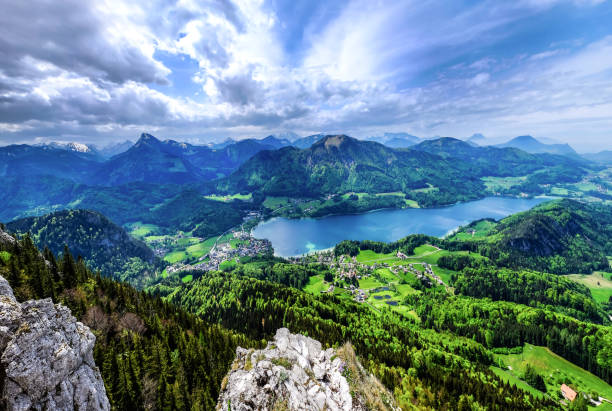View over lake Fuschlsee in Austria Enjoy a view from the Schober over Lake Fuschl in Austria fuschl lake stock pictures, royalty-free photos & images