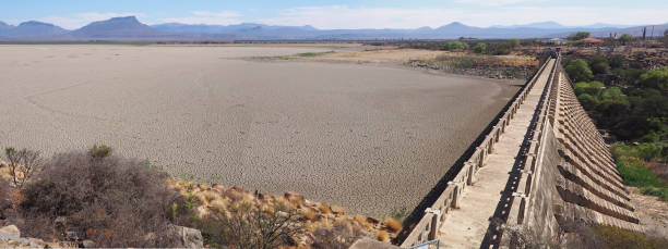 View over parched and empty dam wall stock photo