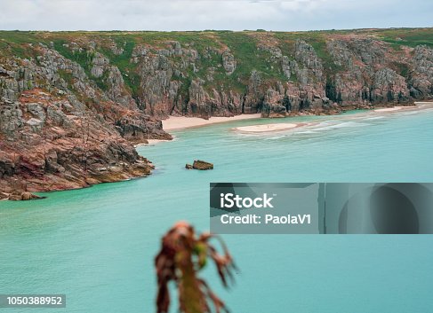 istock View over Pedn Vounder beach  seen from Minack Open Air Theatre; Cornwall; England; UK 1050388952