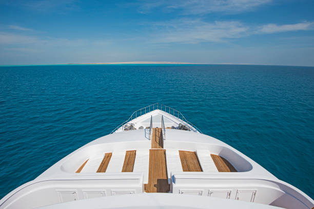View over the bow over a large luxury motor yacht stock photo