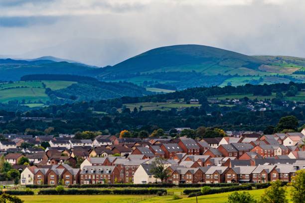 A view overlooking a new housing estate in Penrith, Cumbria, the gate way to the English lake district. A view overlooking a new housing estate in Penrith, Cumbria, the gate way to the English lake district. cumbria stock pictures, royalty-free photos & images
