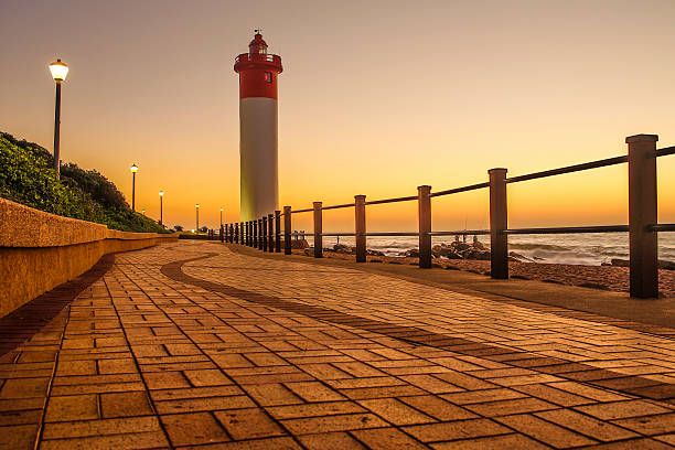 View the sunset at the Umhlanga Rocks Lighthouse Twilight durban stock pictures, royalty-free photos & images