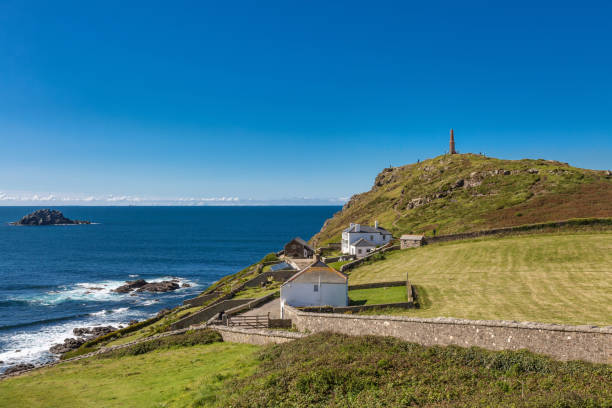 View to Cape Cornwall with old mine Landscape at the end of Cape Cornall, UK headland stock pictures, royalty-free photos & images