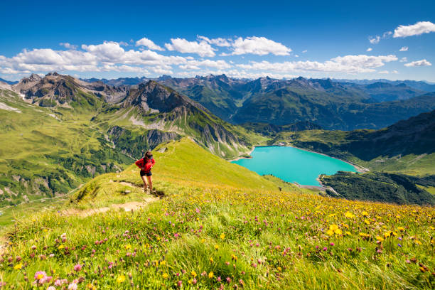 View to the Alps in Austria Awesome view from the mountain Spuller Schafberg to the Lechquellen mountains and the lake Spullersee at the Lech valley in the Alps in Vorarlberg, Austria. lechtal alps stock pictures, royalty-free photos & images