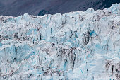 istock Viewing a massive, stunning glacier at Kenai Fjords National Park in Alaska, USA 1358327066