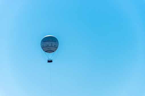 Cracow, Poland - August 27, 2022: Viewing balloon with a blue sky background.