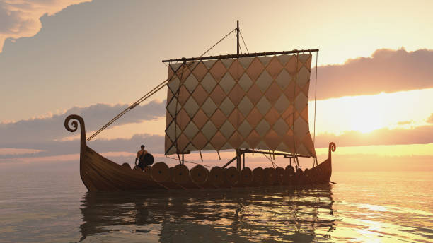 Viking ship at sunset stock photo