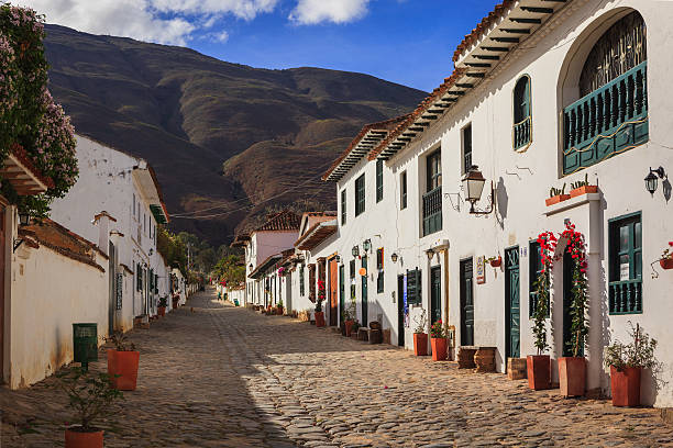 Villa de Leyva, Colombia: Looking Up Calle 14 In The Early Morning Sunlight Towards The Mountains In The Historic 16th Century Andean Town stock photo