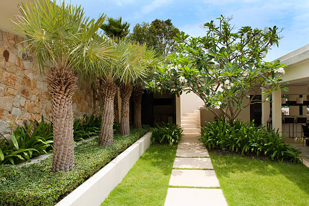Villa Walkway Outdoor Walkway And Courtyard In A Tropical Villa Residence. courtyard stock pictures, royalty-free photos & images