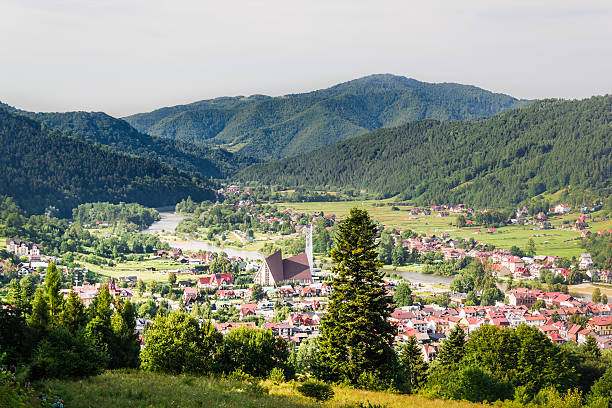 Village in valley. Kroscienko nad Dunajcem, Poland. stock photo