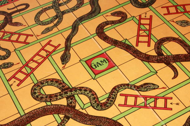 Vintage Antique Snakes and Ladders Board Game stock photo