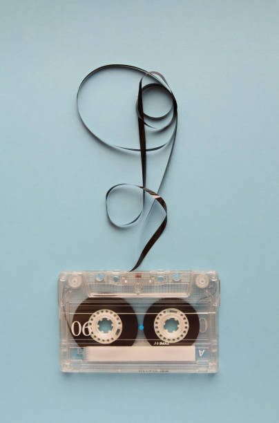 Vintage audio cassette tape on blue background stock photo