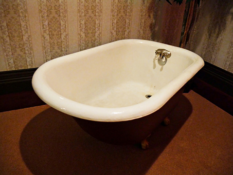 Vintage bathtub displayed inside an 18th century house