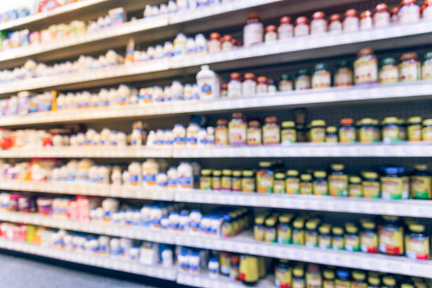 Vintage blurred vitamin store variation of vitamins, supplements stock photo