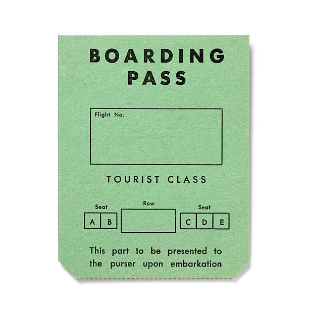 Vintage boarding pass on white - Tourist Class stock photo