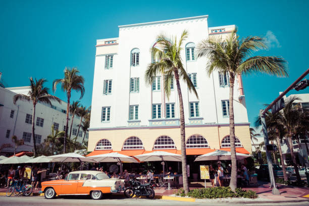 MIAMI BEACH, FLORIDA, USA - FEBRUARY 18, 2018: Vintage Car Parked along Ocean Drive in the Famous Art Deco District in South Beach. South Beach, FL stock photo