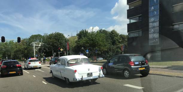 Vintage car Maastricht, Netherlands, - July 09, 2018. Vintage car in the streets of in the city on a warm summer day. 1960 1969 stock pictures, royalty-free photos & images