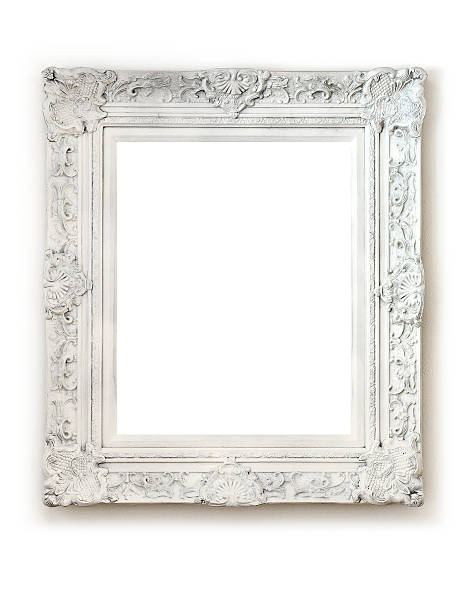 Vintage empty frame on white wall Vintage empty frame isolated on white wall. mirror object photos stock pictures, royalty-free photos & images