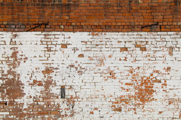 vintage exterior natural red whitewashed brick wall stock photo