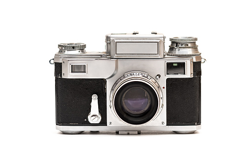 Vintage film camera isolated on white background