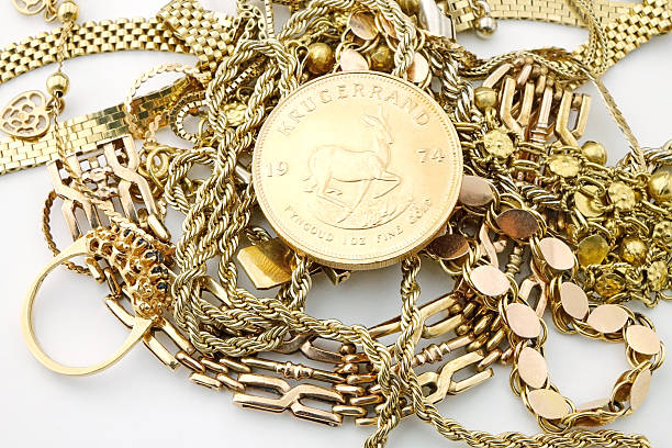 Vintage jewelry with gold coin stock photo