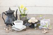 Vintage Inspired Mother’s Day Tea on an Old Rustic White Wood Background