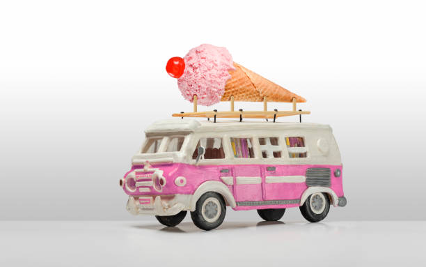Vintage motor home as ice cream truck on white background Fictional Vintage motor home with ice cream on roof - Miniature ice cream truck stock pictures, royalty-free photos & images