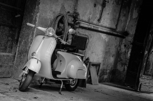 Black and White image of a Vintage Motorcycle Vespa