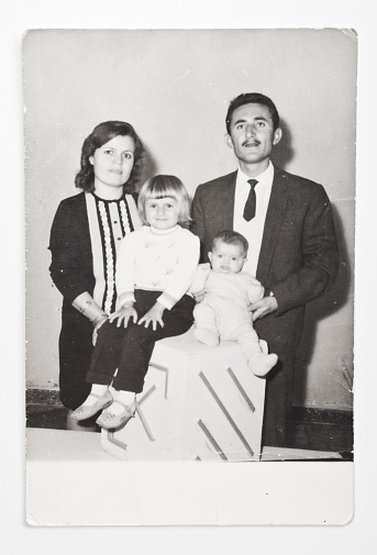 Old family picture was shot in a studio in 1960s