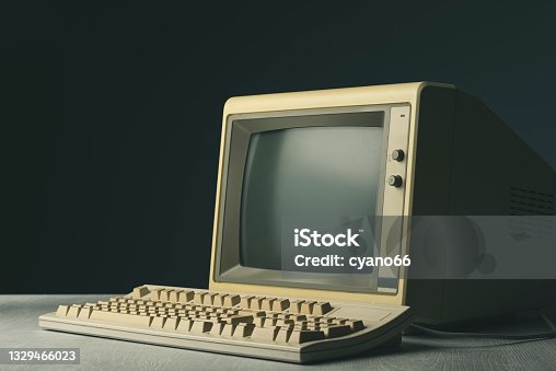 istock Vintage personal computer on a desktop 1329466023