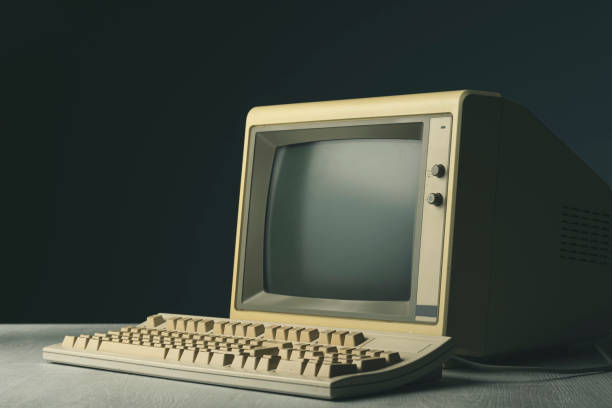 Vintage personal computer on a desktop stock photo