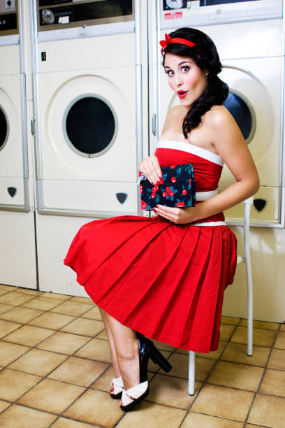 Vintage Pinup girl in a Laundromat stock photo