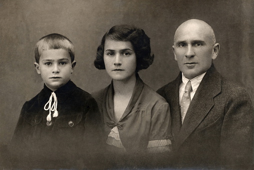 A vintage photo portrait from 1930 of Russian family.